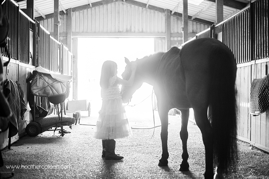 Black and White photography of little girl and horse in Longview tx